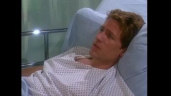 Blonde Nurse With Big Jugs Nina Ferrari Likes To Twittle Twattle With Her Co Worker About Pleasant Looking Patient From Treatment Room